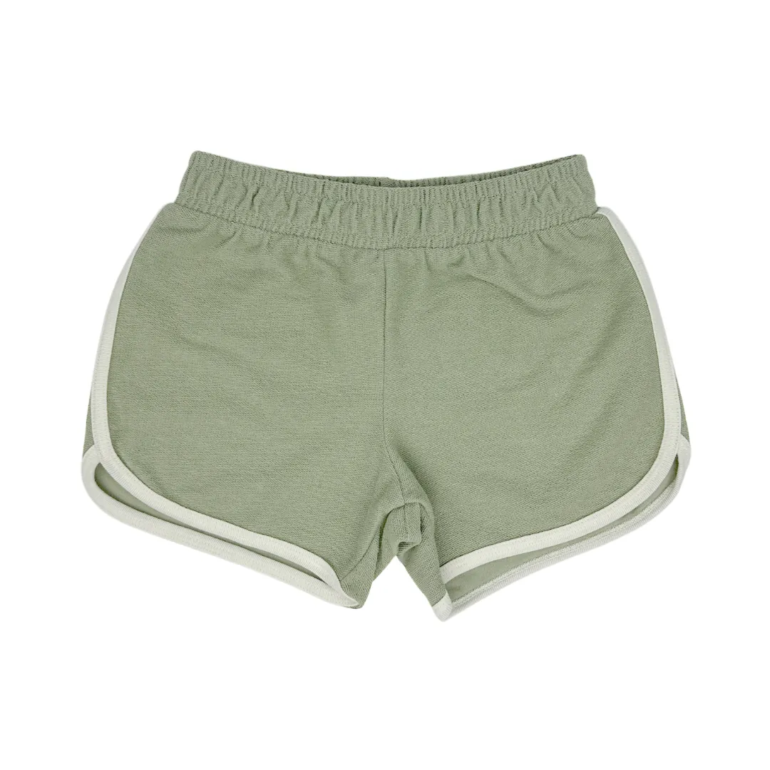Blossom Dolphin Shorts - Matcha von Tiny Whales