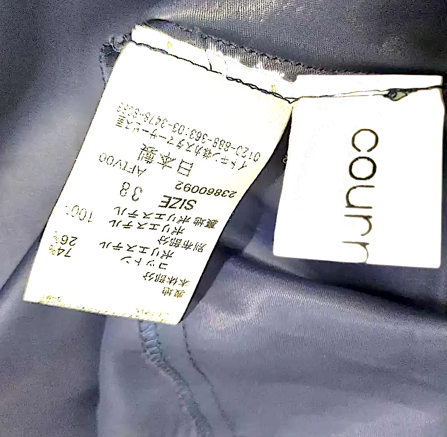 Courreges Paris. Vintage-Schwarzes Kleid mit geometrischem Design und Schlag, unter dem durchsichtigen geometrischen Muster gefüttert