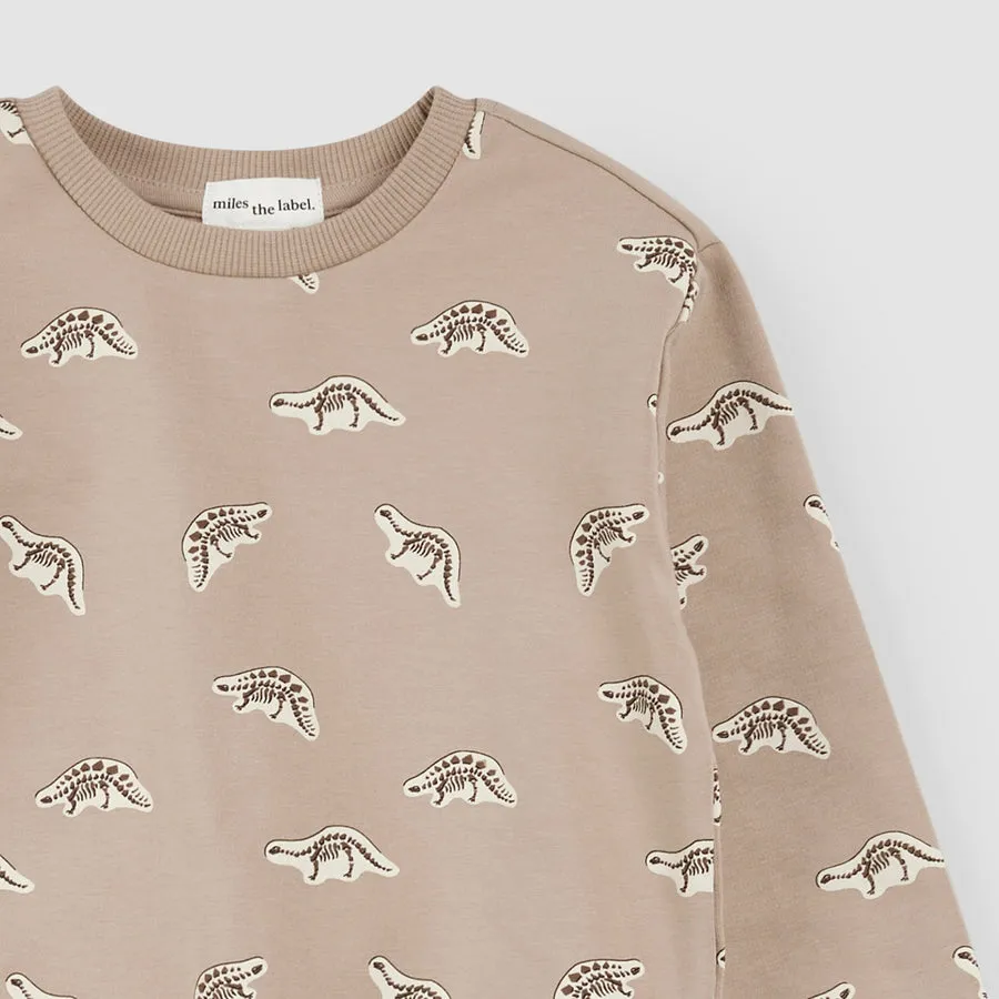 Dino-Fossil-Druck auf taubfarbenem Sweatshirt von miles the label.
