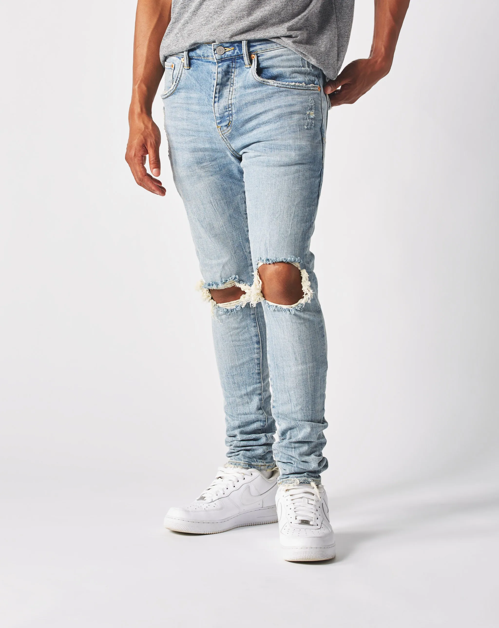 Hellindigoblaue Ausweitung Jeans