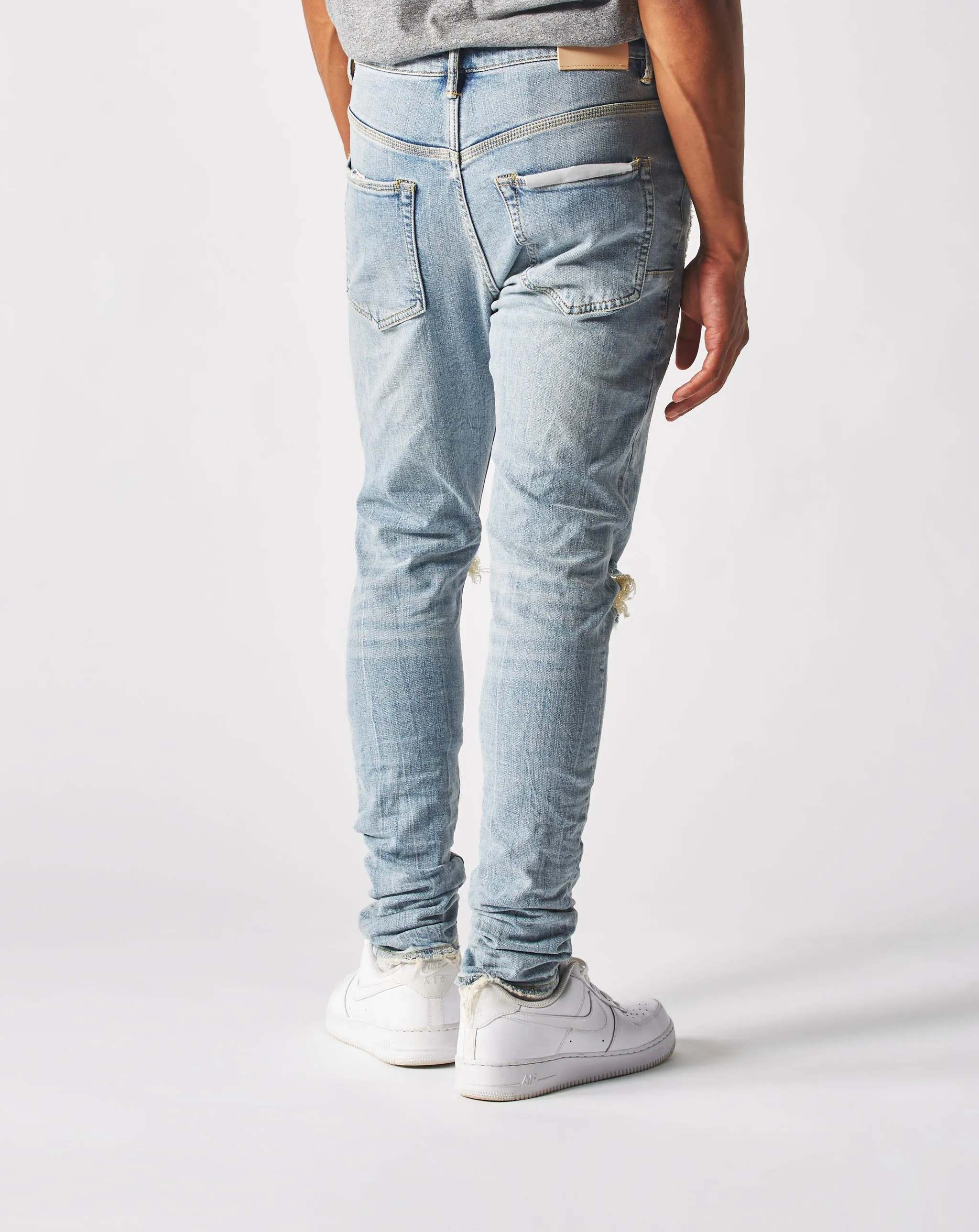 Hellindigoblaue Ausweitung Jeans