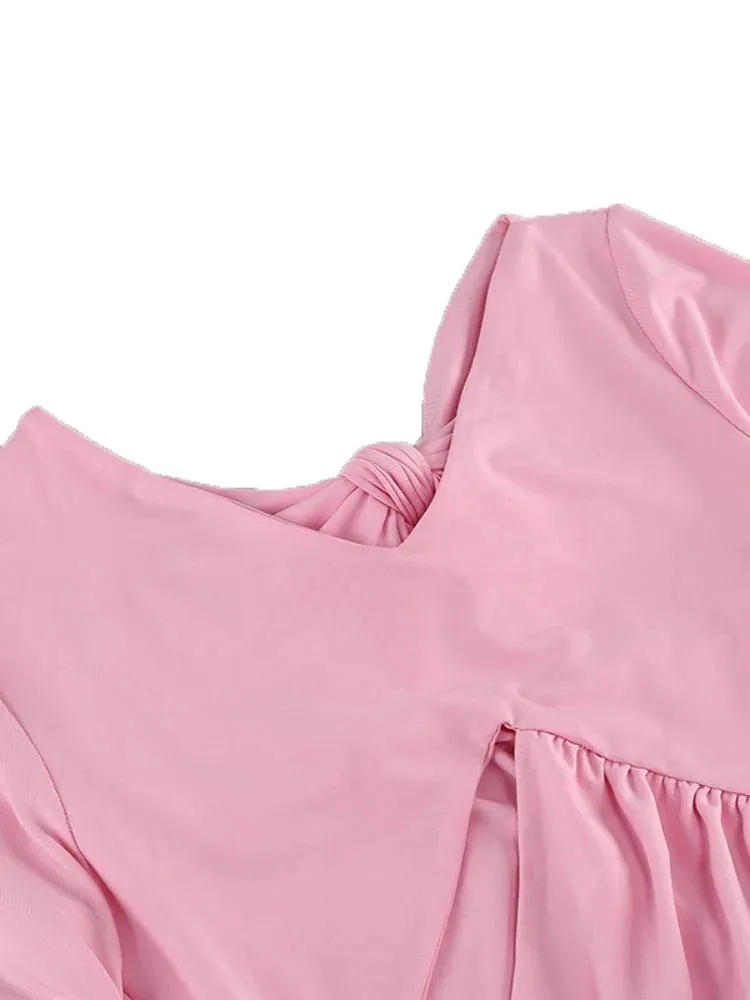 Rosa Maxikleid mit Schleifen und Ausschnitten