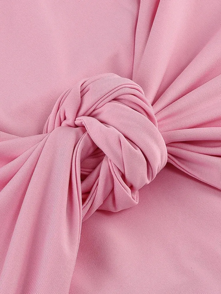 Rosa Maxikleid mit Schleifen und Ausschnitten