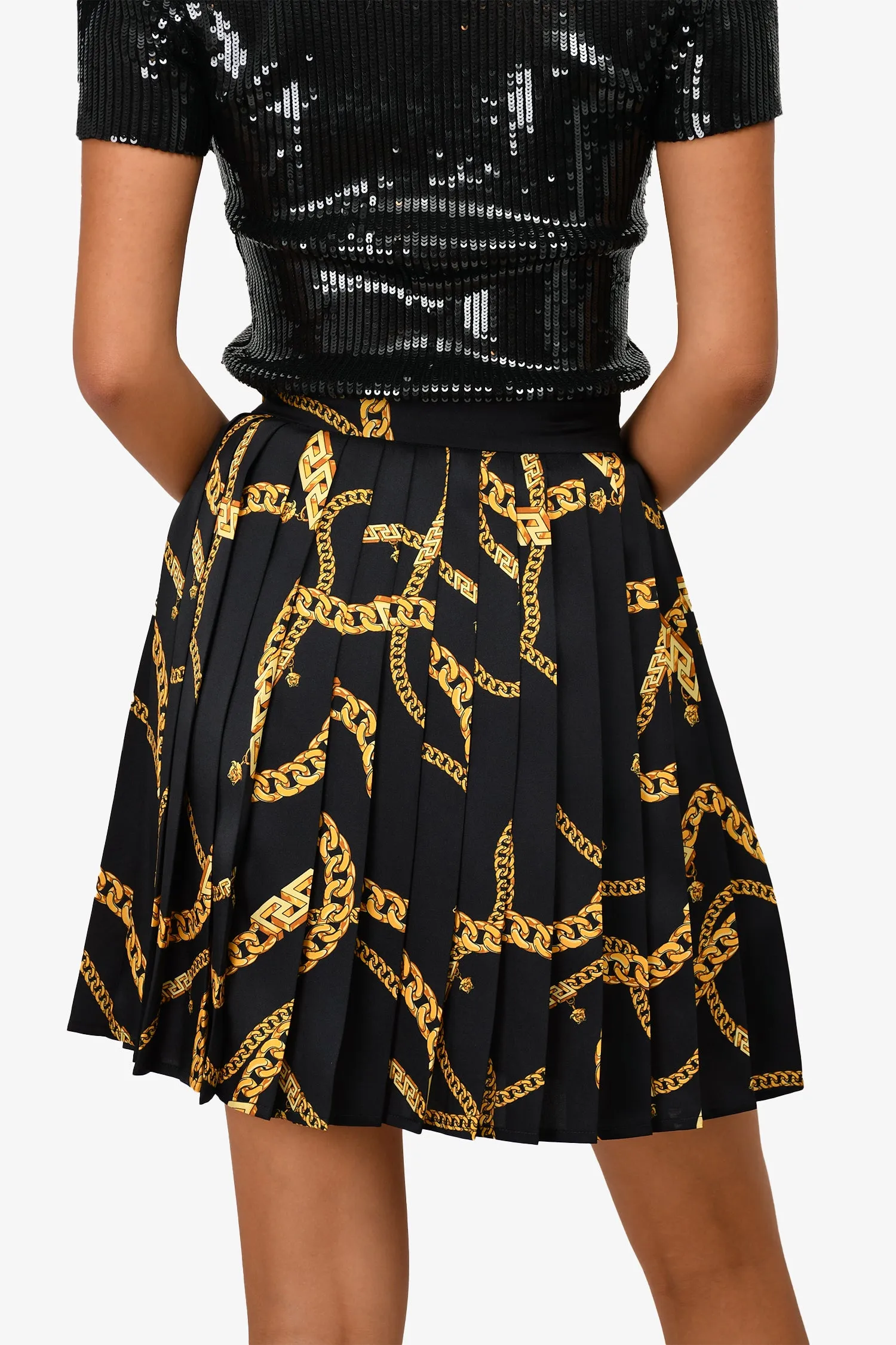 Versace Schwarz/Gold bedruckter Plisseé-Minirock Größe 36